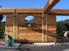 Flattened log walls